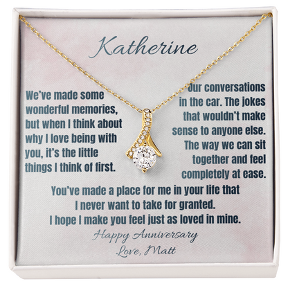 Yellow gold Alluring Beauty necklace on The Little Things anniversary message card