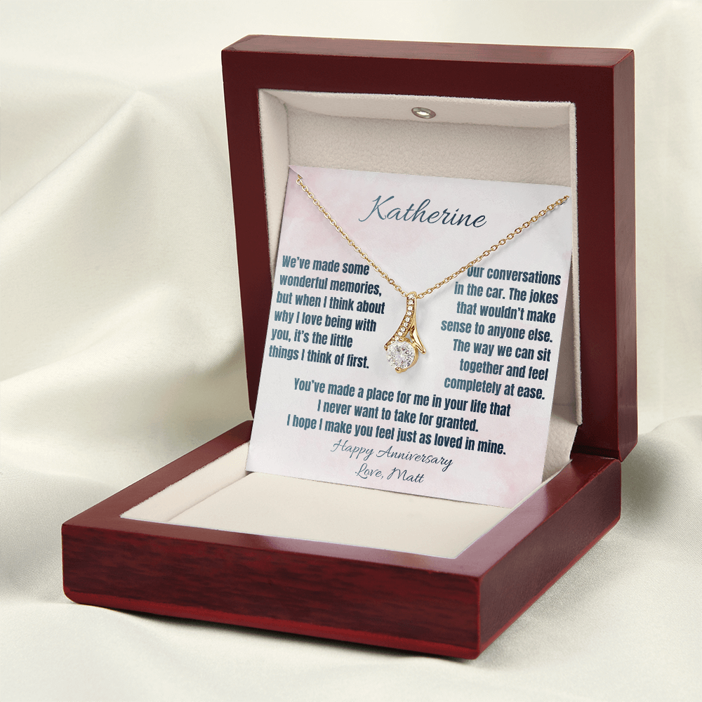 Yellow gold anniversary necklace and Katherine message card in the luxury LED gift box