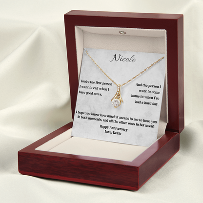 Yellow gold anniversary necklace and message card in the luxury LED gift box